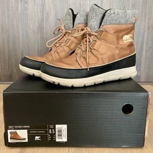 Women Sorel Explorer Carnival winter boots.